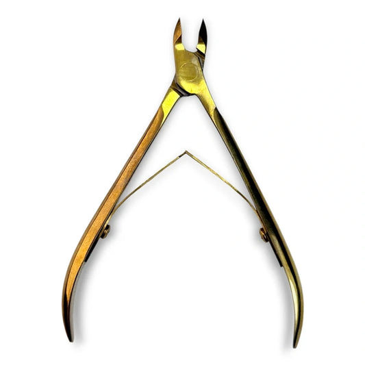 Gold-colored metal cuticle nippers with a polished finish, shown open against a plain white background.