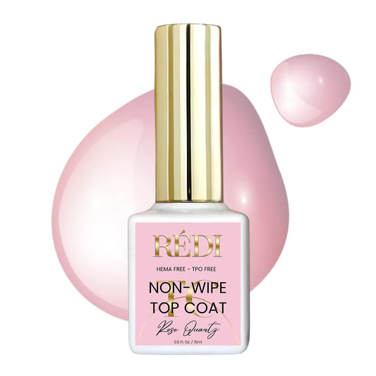 Redi Rose Quartz Pink nail polish bottle with gold cap on a white background